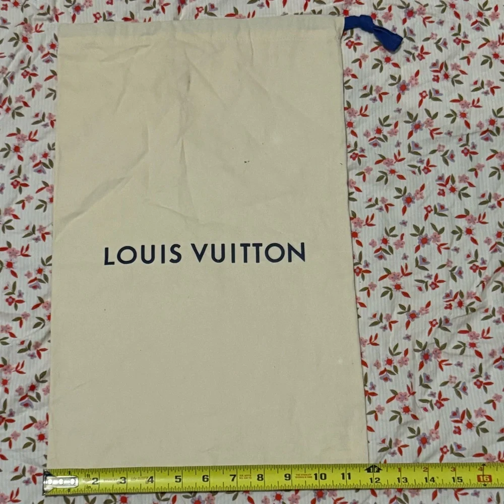 Louis Vuitton beige dust bag with navy logo and blue drawstring